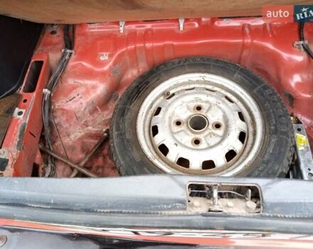Червоний Мазда 323, об'ємом двигуна 1.3 л та пробігом 250 тис. км за 950 $, фото 18 на Automoto.ua