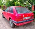 Красный Мазда 323, объемом двигателя 1.1 л и пробегом 335 тыс. км за 800 $, фото 1 на Automoto.ua