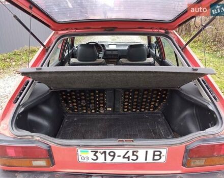 Червоний Мазда 323, об'ємом двигуна 1.3 л та пробігом 250 тис. км за 950 $, фото 13 на Automoto.ua