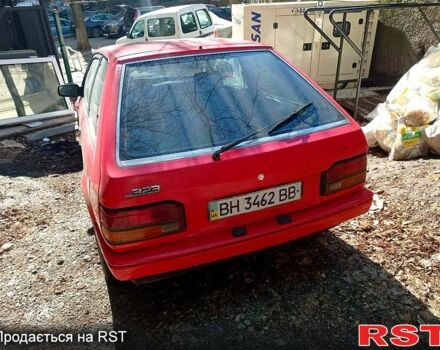 Красный Мазда 323, объемом двигателя 1.6 л и пробегом 506 тыс. км за 750 $, фото 2 на Automoto.ua