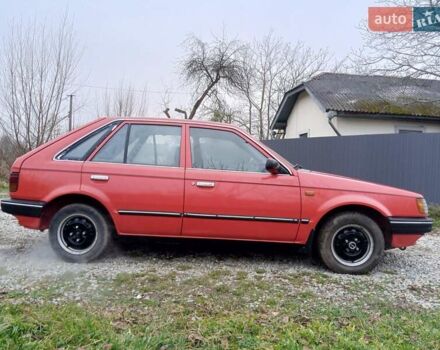 Червоний Мазда 323, об'ємом двигуна 1.3 л та пробігом 250 тис. км за 950 $, фото 5 на Automoto.ua