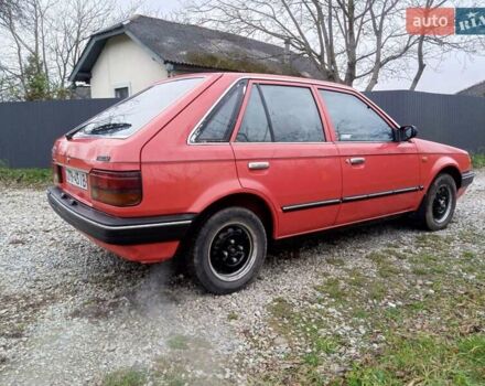 Червоний Мазда 323, об'ємом двигуна 1.3 л та пробігом 250 тис. км за 950 $, фото 4 на Automoto.ua