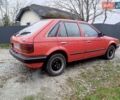 Червоний Мазда 323, об'ємом двигуна 1.3 л та пробігом 250 тис. км за 950 $, фото 4 на Automoto.ua