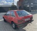 Красный Мазда 323, объемом двигателя 1.3 л и пробегом 225 тыс. км за 650 $, фото 2 на Automoto.ua