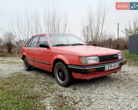 Червоний Мазда 323, об'ємом двигуна 1.3 л та пробігом 250 тис. км за 950 $, фото 7 на Automoto.ua
