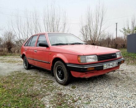 Червоний Мазда 323, об'ємом двигуна 1.3 л та пробігом 250 тис. км за 950 $, фото 6 на Automoto.ua