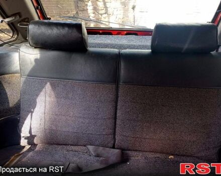 Красный Мазда 323, объемом двигателя 1.6 л и пробегом 506 тыс. км за 750 $, фото 3 на Automoto.ua