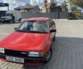 Красный Мазда 323, объемом двигателя 1.3 л и пробегом 225 тыс. км за 650 $, фото 1 на Automoto.ua