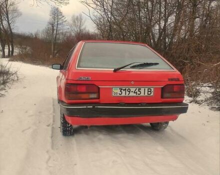 Красный Мазда 323, объемом двигателя 1.3 л и пробегом 250 тыс. км за 1200 $, фото 3 на Automoto.ua