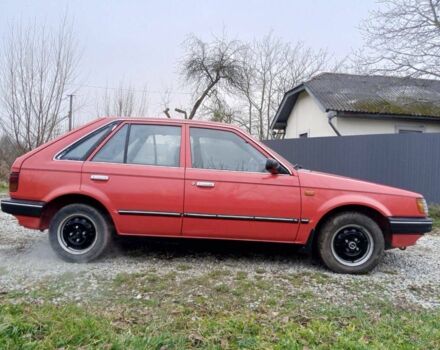 Червоний Мазда 323, об'ємом двигуна 1.3 л та пробігом 250 тис. км за 950 $, фото 2 на Automoto.ua