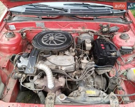 Червоний Мазда 323, об'ємом двигуна 1.3 л та пробігом 250 тис. км за 950 $, фото 14 на Automoto.ua