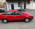 Червоний Мазда 323, об'ємом двигуна 1.5 л та пробігом 270 тис. км за 1100 $, фото 1 на Automoto.ua