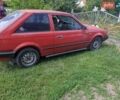 Красный Мазда 323, объемом двигателя 1.3 л и пробегом 100 тыс. км за 600 $, фото 1 на Automoto.ua