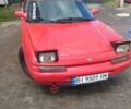 Червоний Мазда 323, об'ємом двигуна 2 л та пробігом 310 тис. км за 1427 $, фото 1 на Automoto.ua