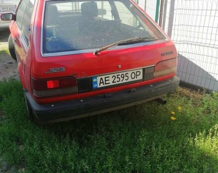 Червоний Мазда 323, об'ємом двигуна 1.5 л та пробігом 408 тис. км за 800 $, фото 1 на Automoto.ua