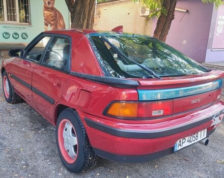 Красный Мазда 323, объемом двигателя 1.8 л и пробегом 444 тыс. км за 1200 $, фото 5 на Automoto.ua