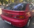 Красный Мазда 323, объемом двигателя 1.6 л и пробегом 150 тыс. км за 911 $, фото 1 на Automoto.ua