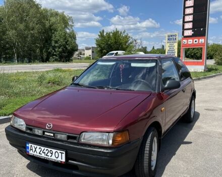 Червоний Мазда 323, об'ємом двигуна 1.3 л та пробігом 400 тис. км за 2000 $, фото 1 на Automoto.ua