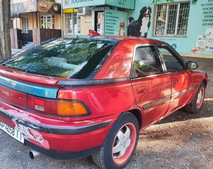 Красный Мазда 323, объемом двигателя 1.8 л и пробегом 444 тыс. км за 1200 $, фото 4 на Automoto.ua