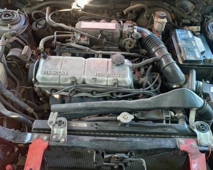 Красный Мазда 323, объемом двигателя 1.8 л и пробегом 444 тыс. км за 1200 $, фото 9 на Automoto.ua