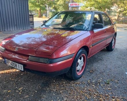 Красный Мазда 323, объемом двигателя 1.8 л и пробегом 444 тыс. км за 1200 $, фото 7 на Automoto.ua