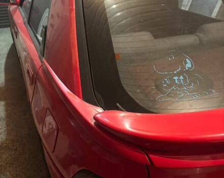 Красный Мазда 323, объемом двигателя 1.8 л и пробегом 150 тыс. км за 750 $, фото 2 на Automoto.ua