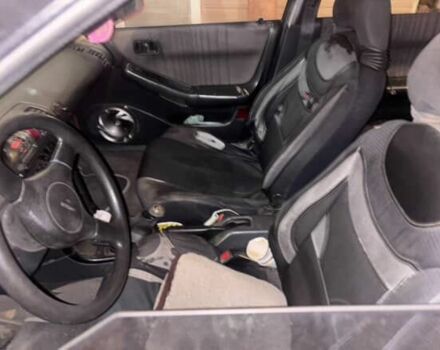 Красный Мазда 323, объемом двигателя 1.8 л и пробегом 150 тыс. км за 750 $, фото 6 на Automoto.ua