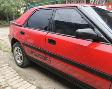 Червоний Мазда 323, об'ємом двигуна 1.6 л та пробігом 317 тис. км за 1550 $, фото 8 на Automoto.ua