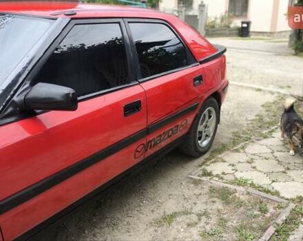 Червоний Мазда 323, об'ємом двигуна 1.6 л та пробігом 317 тис. км за 1550 $, фото 4 на Automoto.ua