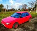 Красный Мазда 323, объемом двигателя 1.6 л и пробегом 210 тыс. км за 700 $, фото 1 на Automoto.ua