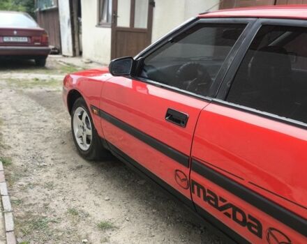 Красный Мазда 323, объемом двигателя 1 л и пробегом 317 тыс. км за 1550 $, фото 4 на Automoto.ua