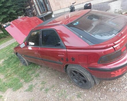Красный Мазда 323, объемом двигателя 2 л и пробегом 400 тыс. км за 1500 $, фото 2 на Automoto.ua