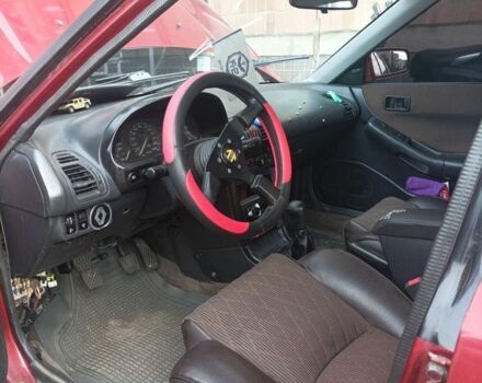 Красный Мазда 323, объемом двигателя 2 л и пробегом 400 тыс. км за 1500 $, фото 3 на Automoto.ua