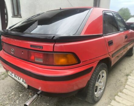 Красный Мазда 323, объемом двигателя 1 л и пробегом 317 тыс. км за 1550 $, фото 9 на Automoto.ua