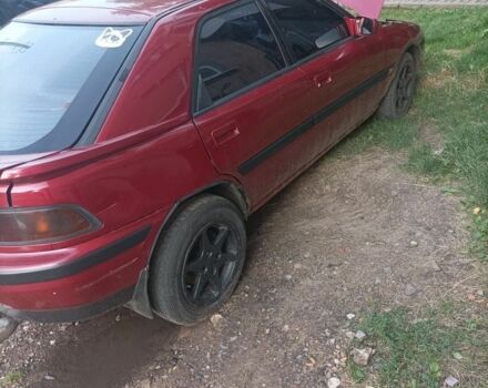 Красный Мазда 323, объемом двигателя 2 л и пробегом 400 тыс. км за 1500 $, фото 4 на Automoto.ua