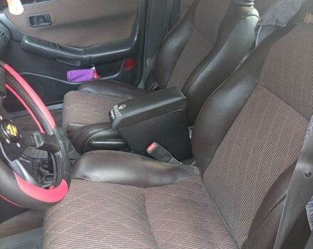 Красный Мазда 323, объемом двигателя 2 л и пробегом 400 тыс. км за 1500 $, фото 5 на Automoto.ua