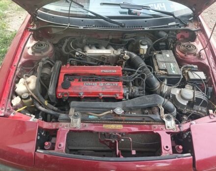 Красный Мазда 323, объемом двигателя 2 л и пробегом 400 тыс. км за 1500 $, фото 1 на Automoto.ua