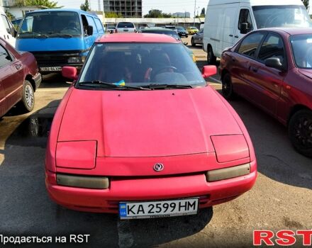 Красный Мазда 323, объемом двигателя 1.8 л и пробегом 143 тыс. км за 1650 $, фото 3 на Automoto.ua