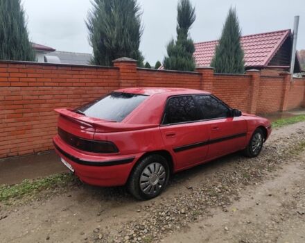 Красный Мазда 323, объемом двигателя 6 л и пробегом 130 тыс. км за 1500 $, фото 2 на Automoto.ua