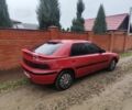 Красный Мазда 323, объемом двигателя 6 л и пробегом 130 тыс. км за 1500 $, фото 2 на Automoto.ua
