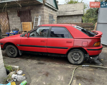 Красный Мазда 323, объемом двигателя 1.6 л и пробегом 400 тыс. км за 1297 $, фото 3 на Automoto.ua