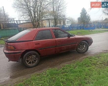 Красный Мазда 323, объемом двигателя 1.6 л и пробегом 260 тыс. км за 1550 $, фото 4 на Automoto.ua