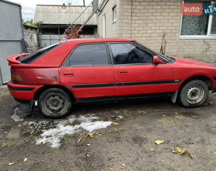 Красный Мазда 323, объемом двигателя 1.6 л и пробегом 400 тыс. км за 1297 $, фото 6 на Automoto.ua