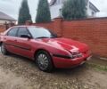 Красный Мазда 323, объемом двигателя 6 л и пробегом 130 тыс. км за 1500 $, фото 1 на Automoto.ua