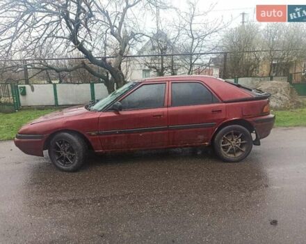 Красный Мазда 323, объемом двигателя 1.6 л и пробегом 260 тыс. км за 1550 $, фото 3 на Automoto.ua