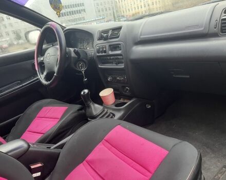 Красный Мазда 323, объемом двигателя 1.5 л и пробегом 323 тыс. км за 1100 $, фото 11 на Automoto.ua