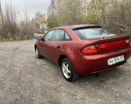 Красный Мазда 323, объемом двигателя 1.5 л и пробегом 323 тыс. км за 1100 $, фото 1 на Automoto.ua