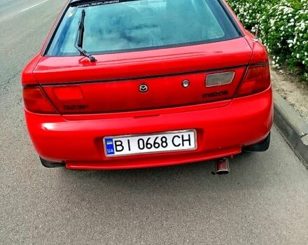 Красный Мазда 323, объемом двигателя 1.5 л и пробегом 240 тыс. км за 2300 $, фото 11 на Automoto.ua