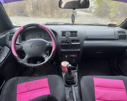 Красный Мазда 323, объемом двигателя 1.5 л и пробегом 323 тыс. км за 1100 $, фото 12 на Automoto.ua