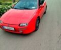 Красный Мазда 323, объемом двигателя 1.5 л и пробегом 240 тыс. км за 2300 $, фото 2 на Automoto.ua